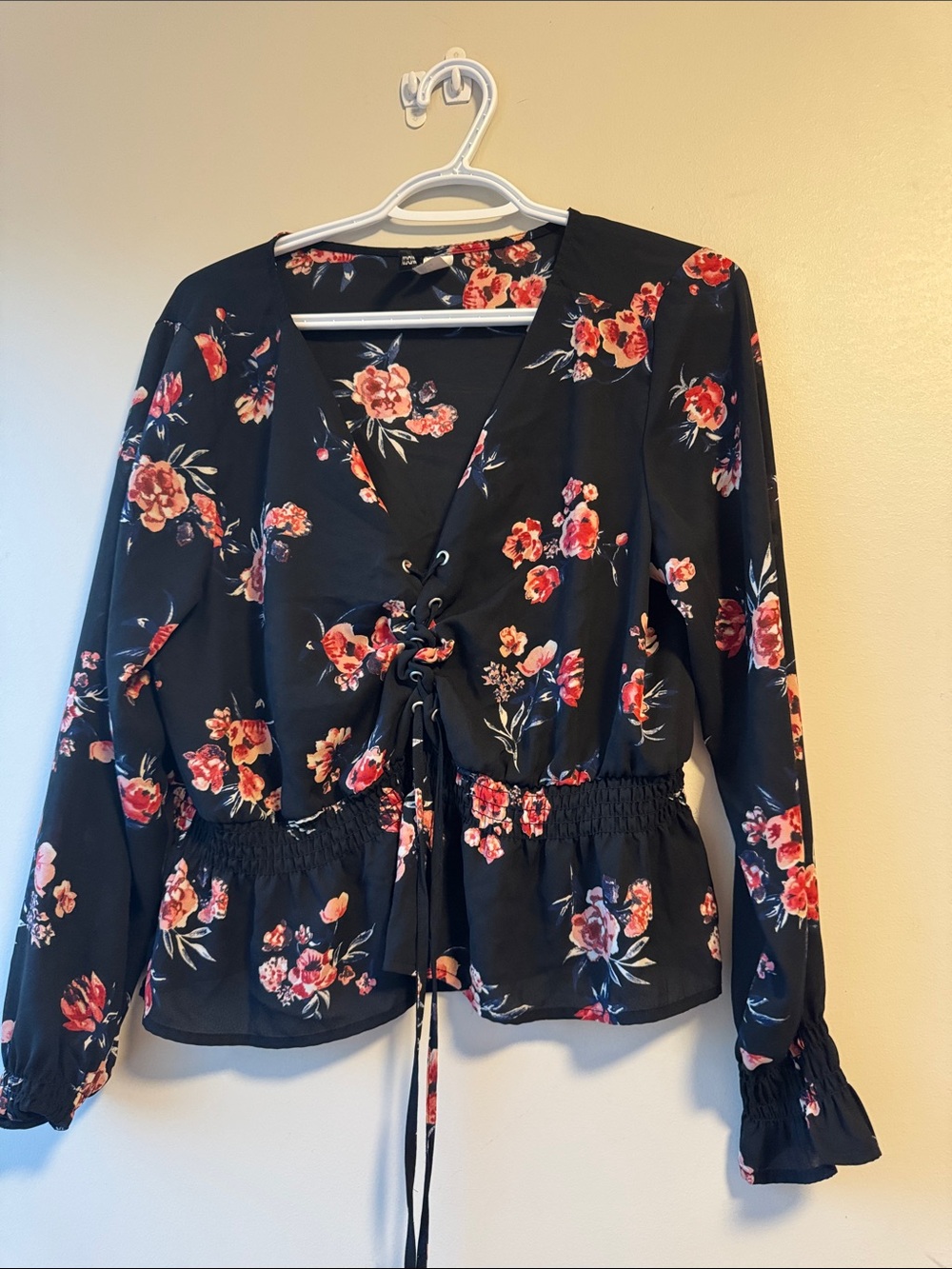 Divided Black Floral Tie-Front Blouse with Pink Flowers